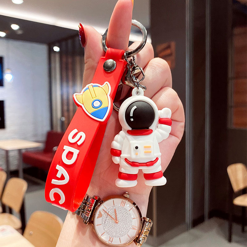 Wholesale Cartoon Waving Astronaut Soft Rubber Keychains